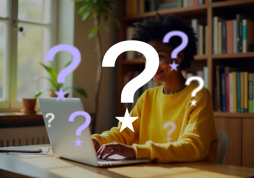 A personal on a laptop with hovering question-marks